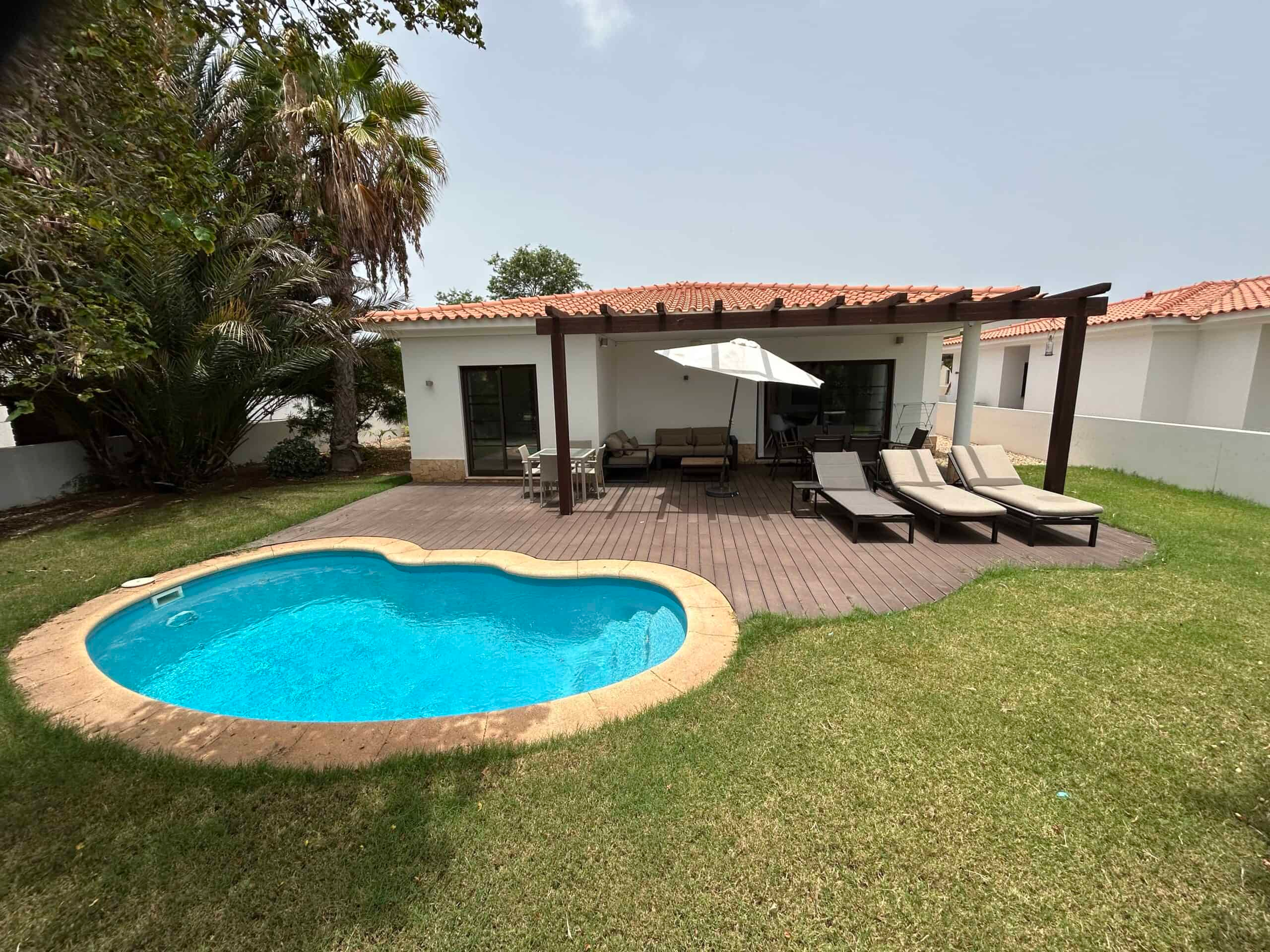 Cape Verde Properties – Spectacular 4-Bed Beachfront Villa at Tortuga Beach Resort, Sal - garden and pool view