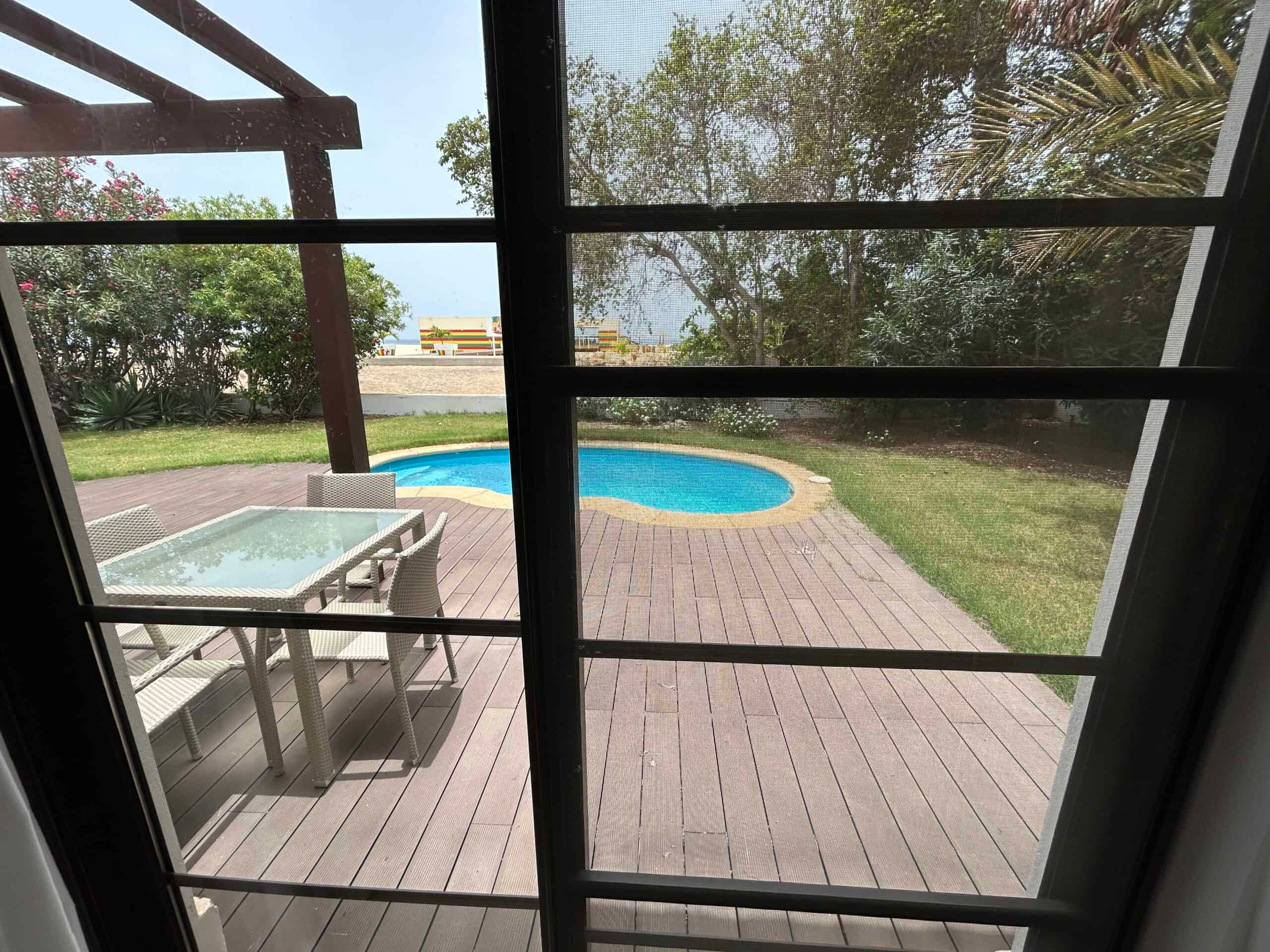 Cape Verde Properties – Spectacular 4-Bed Beachfront Villa at Tortuga Beach Resort, Sal - garden and pool view