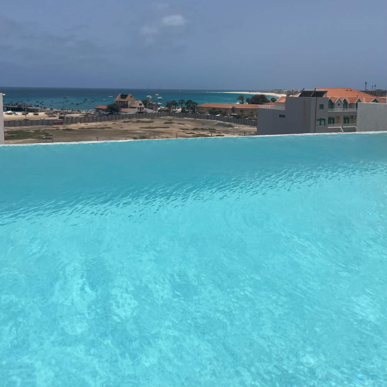 Property for Sale Cape Verde: Stylish Boutique Hotel in the Heart of Santa Maria - infinity pool view